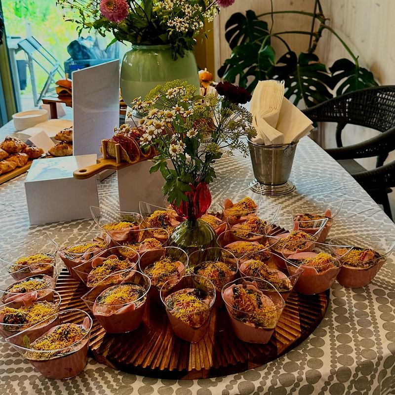 Birthday grazing table set in a garden room