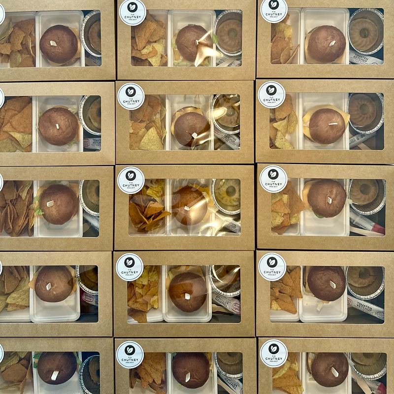 Rows of bento boxes for a graduation party